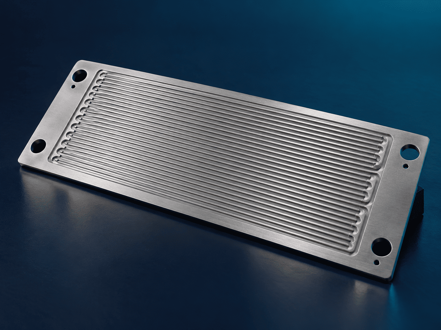 Representative titanium PEM electrolyser bipolar plate with precision flow channels